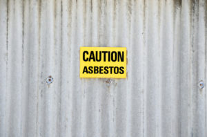 Maryland Mesothelioma Lawyer - Sign with warning for asbestos